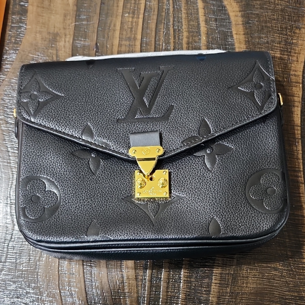 Louis Vuitton Black and Gold Monogram Clutch